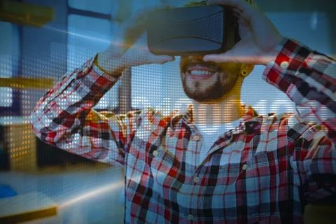 Binary code on digital screen against man using virtual reality headset 스톡 사진