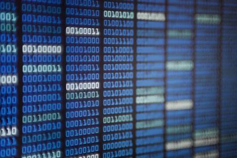 Binary code on display screen. white blue light green colors number one and z Foto stock