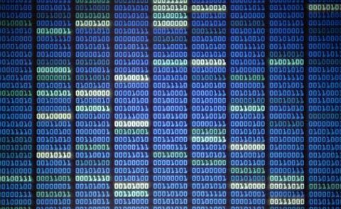 Binary code on display screen. white blue light green colors number one and z Stock Photos