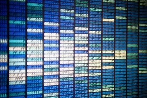 Binary code on display screen. white blue light green colors number one and z Stock Photos