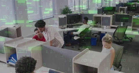 Binary code floating in tech office overlaying systems and merging data while Stock Footage 311916512