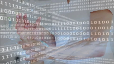 With binary code flowing, man lifting left forearm, pressing wrist to monitor 库存影片 311585669