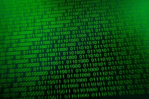 Binary code green blue digital color on black background with zoom effect for Stock Photos
