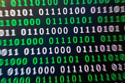 Binary code green blue digital color on black background with zoom effect for Stock Photos