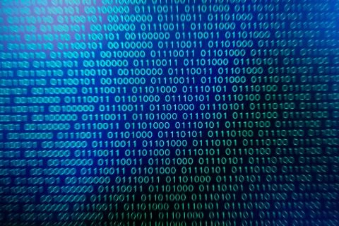 Binary code green blue digital color on black background with zoom effect for Foto stock