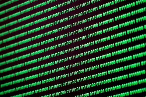 Binary code green blue digital color on black background with zoom effect for 写真素材