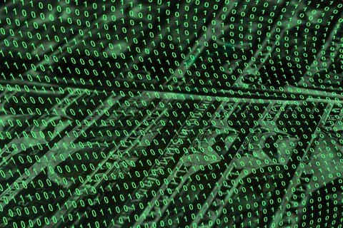 Binary code grid from bright green numbers on the background of dollar bankno 스톡 사진