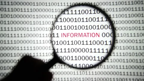 Binary code, information detected by magnifying glass. 스톡 동영상 149500274