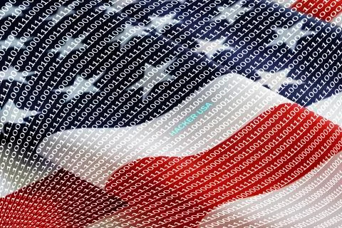 Binary code with inscription hacker usa on background of American flag. 库存照片
