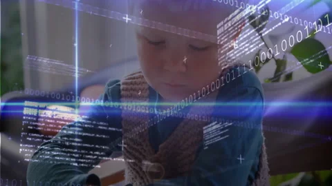 Binary code overlay flickering and leading boy at table molding blue clay Stock Footage 312280861