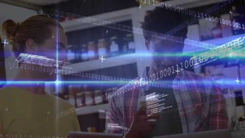 Binary code overlay initiating retail tech review as colleagues analyzing data Stock Footage 310326279