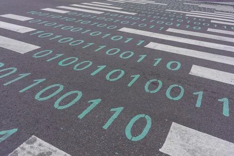 Binary code painted on the pedestrian crossing 写真素材