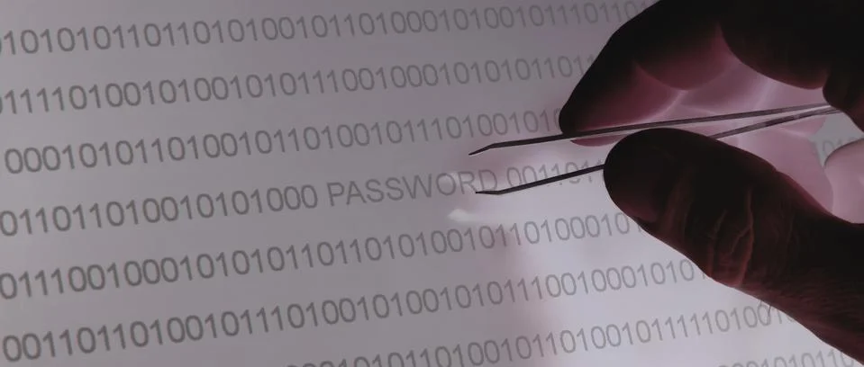 Binary code, password vulnerability taking out with tweezers Stock Photos