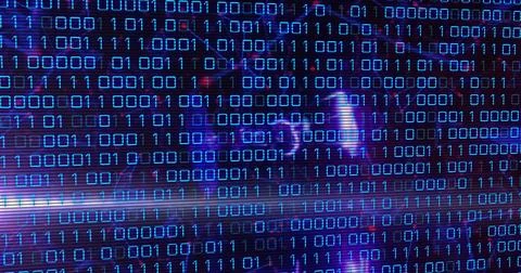 Binary code pattern glowing on digital screen, representing data and technology Stock Photos