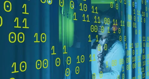 Binary code revealing IT technician inspecting blinking server rack lights for Stock Footage 311506043