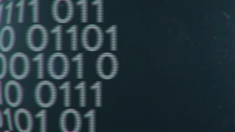 Binary Code Running on an Old Monitor Stock Footage 100447579