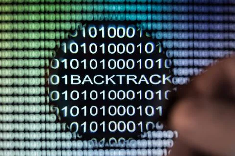 Binary code screen Binary code, magnifying glass shows backtrack exploit b... 库存照片