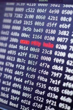 Binary code screen close up Stock Photos