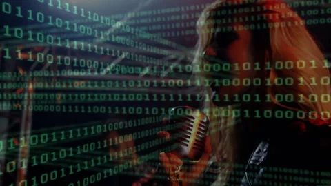 Binary code scrolling revealing vocalist figure while raising microphone and Stock Footage 311604807
