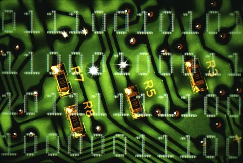 Binary code superimposed over a circuit board 写真素材