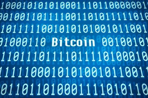 Binary code with the word Bitcoin in the center Binary code with the word ... 스톡 사진