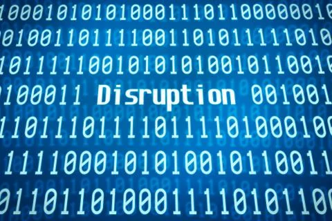 Binary code with the word Disruption in the center Stock Photos