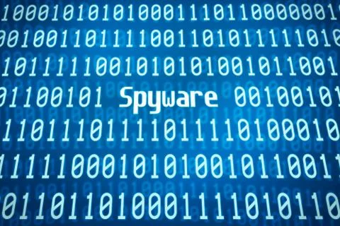 Binary code with the word spyware in the center イラスト素材