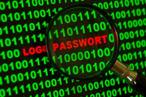 Binary code with the words Login Passwort viewed through a magnifying glass Stock Photos