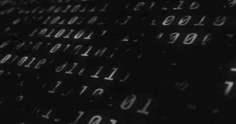 Binary codes with white font color projected on a black screen background with Video stock 143574439