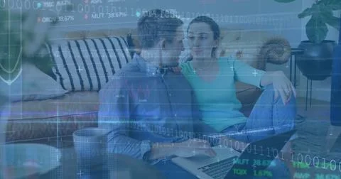 Binary coding and data processing image over couple using laptop on couch 스톡 사진