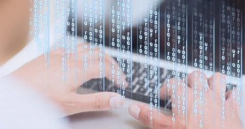 Binary coding data processing against mid section of person using laptop 스톡 사진