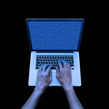 Binary Coding on the Laptop A developer in informatics is using a laptop t... Foto stock