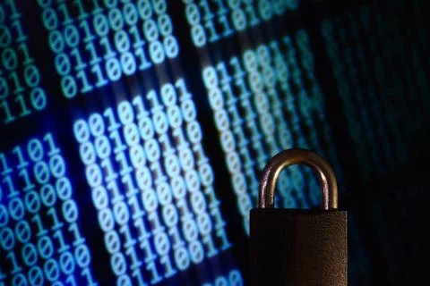 Binary computer language matrix blurred be hide an iron Padlock. sign of comp Foto stock