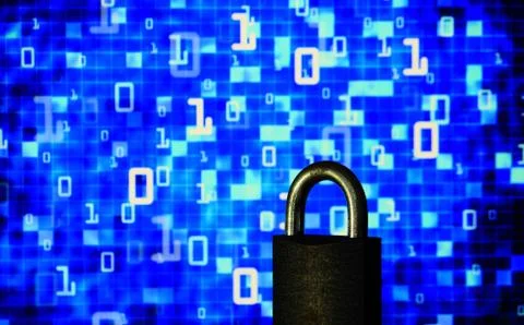 Binary computer language matrix blurred be hide an iron Padlock. sign of comp 库存照片