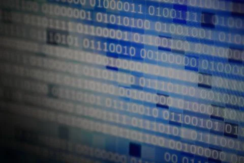 Binary data code. side way motion of one and zero text moving on computer mon 写真素材