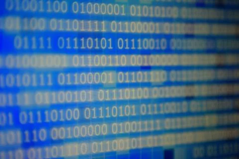 Binary data code. side way motion of one and zero text moving on computer mon Foto stock