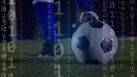 Binary digits appearing network overlaying ball soccer player planting foot Stock Footage 333790127