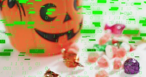 Binary glitch effect starting, flooding jack-o'-lantern bucket and candies to Stock Footage 317791787