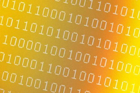 Binary numbers on pixelated yellow computer screen 库存照片