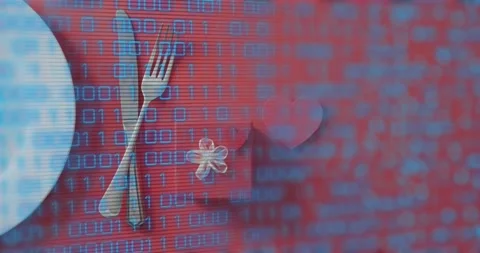 Binary overlay appearing across table scrolling over plate, utensils and napkin, 库存影片 317772719