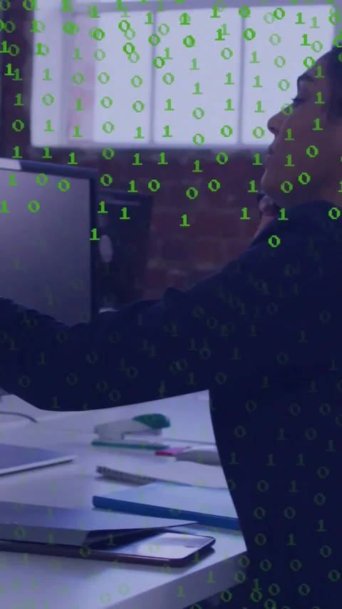 Binary overlay appearing, seated coworker turning and reaching to accept handoff Stock Footage 331009268