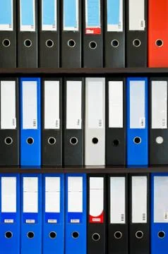 Binder folders in shelf Stock Photos
