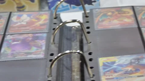 A Binder of Pokemon Cards Stock Footage 202112065