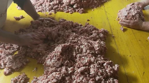 Binding and processing of fresh salami from the butcher Stock Footage 101445653