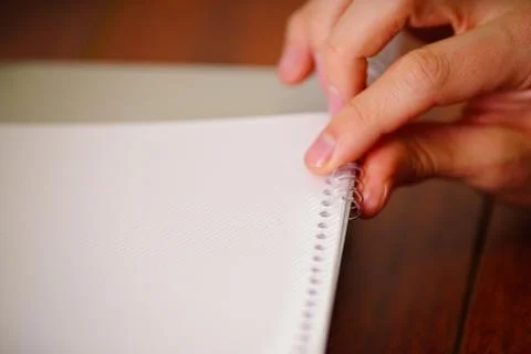 Binding documents with plastic ring binder by using ring binding machine Stock Photos