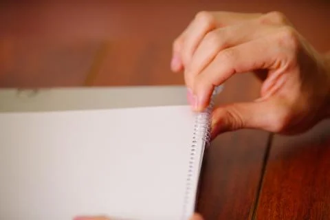 Binding documents with plastic ring binder by using ring binding machine Stock Photos