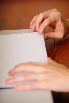 Binding documents with plastic ring binder by using ring binding machine Stock Photos