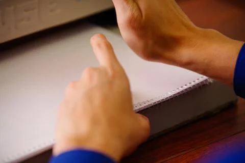 Binding documents with plastic ring binder by using ring binding machine Stock Photos