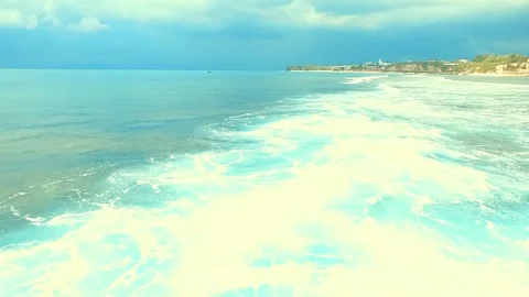 Bingin beach Bali Indonesea soft wave low tide relax rock coral riff point Stock Footage 106570537