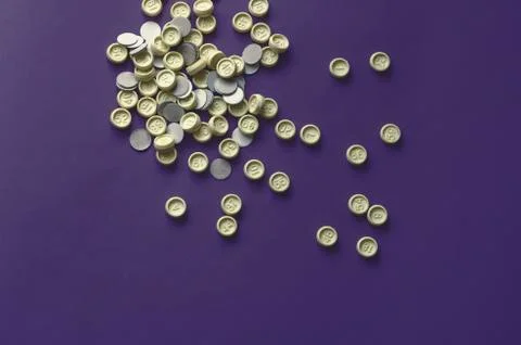 Bingo game plastic chips on  blue background. Stock Photos
